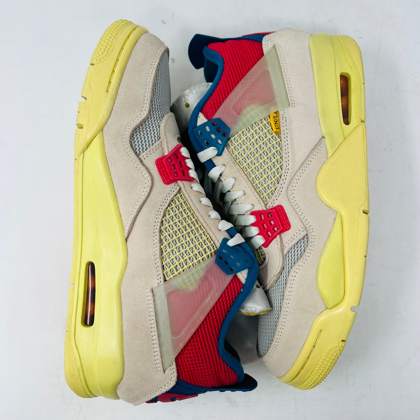 Jordan 4 Retro Union Guava Ice