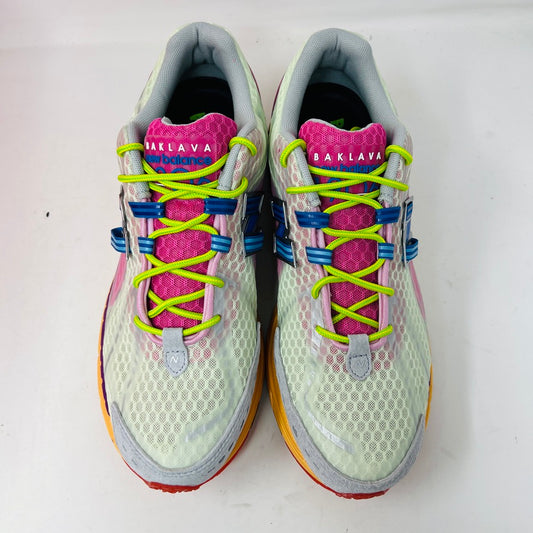 The New Balance 1906R Action Bronson Rosewater sneakers feature white mesh uppers, pink tongues with Baklava, neon green laces, blue accents, and orange midsoles. In BRAND NEW condition, theyre straight from the box.