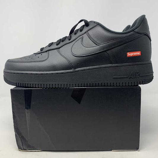 Nike Supreme Air Force 1 Black shoes, brand new, on a box with Supreme laces.