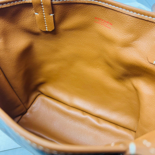 Goyard Anjou Mini Bag in black and tan, brand new condition.