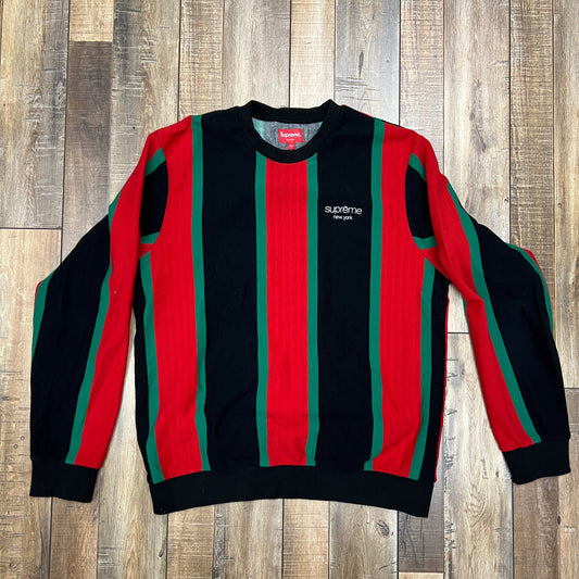 Supreme Vertical Striped Pique Crewneck in black with red and green stripes, preowned condition.