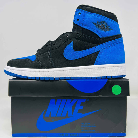 Jordan 1 Retro High OG Royal Reimagined sneakers 2023 in black and royal blue on box.