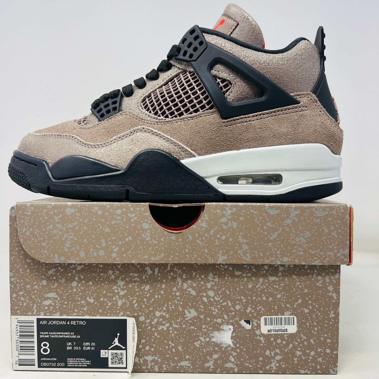 Jordan 4 Retro Taupe Haze sneakers, 2021, condition 8.5/10, displayed on box.