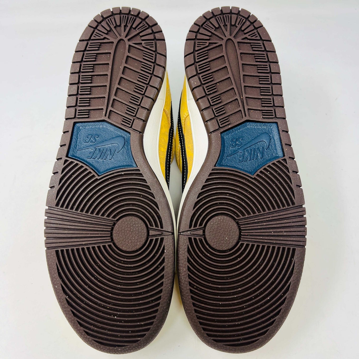Nike SB Dunk Low City of Cinema 2024 outsole, brown with detailed tread pattern.