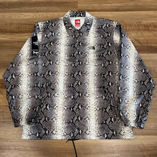 Supreme The North Face Snakeskin Taped Seam Coaches Jacket in black, size M, brand new condition.