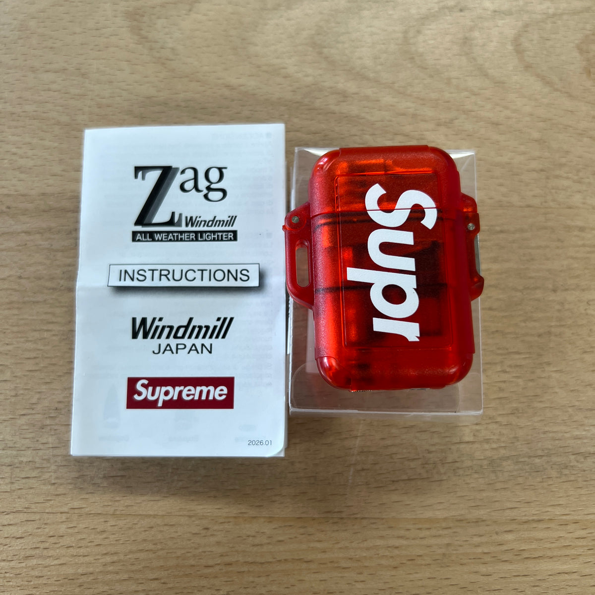 Supreme Windmill Zag Lighter Red