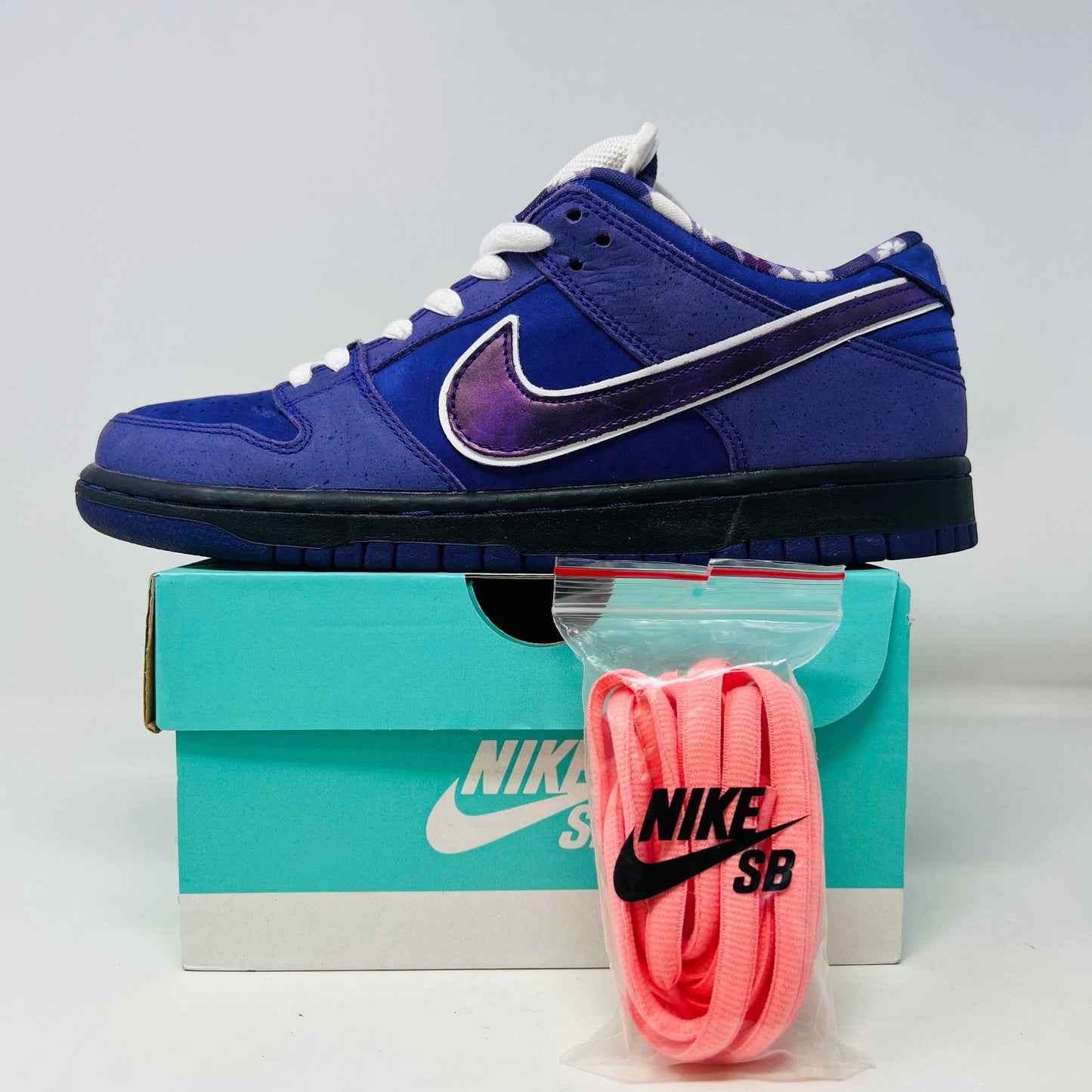 Nike SB Dunk Low Concepts Purple Lobster sneaker with extra laces and rep box.