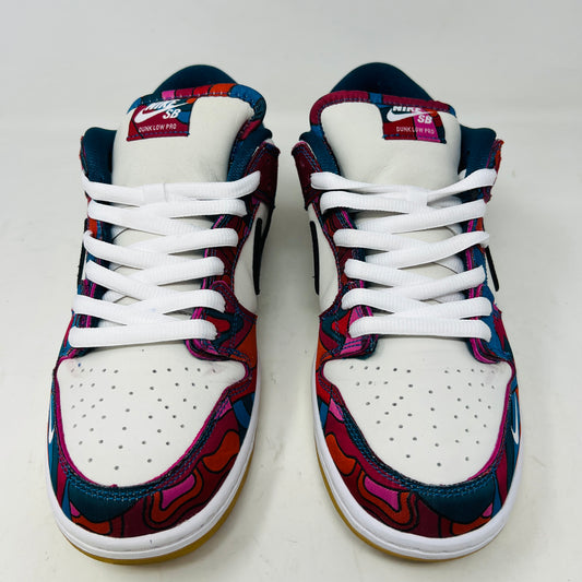 The Nike SB Dunk Low Pro Parra Abstract Art (2021) features a colorful design with abstract red, blue, and purple patterns on a white base. It includes clean uppers with a black swoosh, white laces, and comes in a green/yellow box with extra blue laces for added versatility.