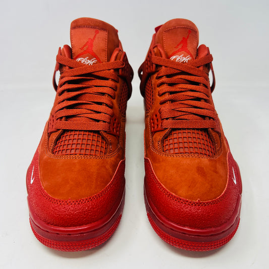 Air Jordan 4 Retro OG SP Nigel Sylvester Brick by Brick sneaker with extra laces and Velcro straps on a textured box.