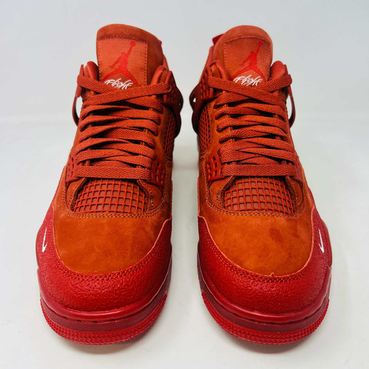 Air Jordan 4 Retro OG SP Nigel Sylvester Brick by Brick sneaker with extra laces and Velcro straps on a textured box.