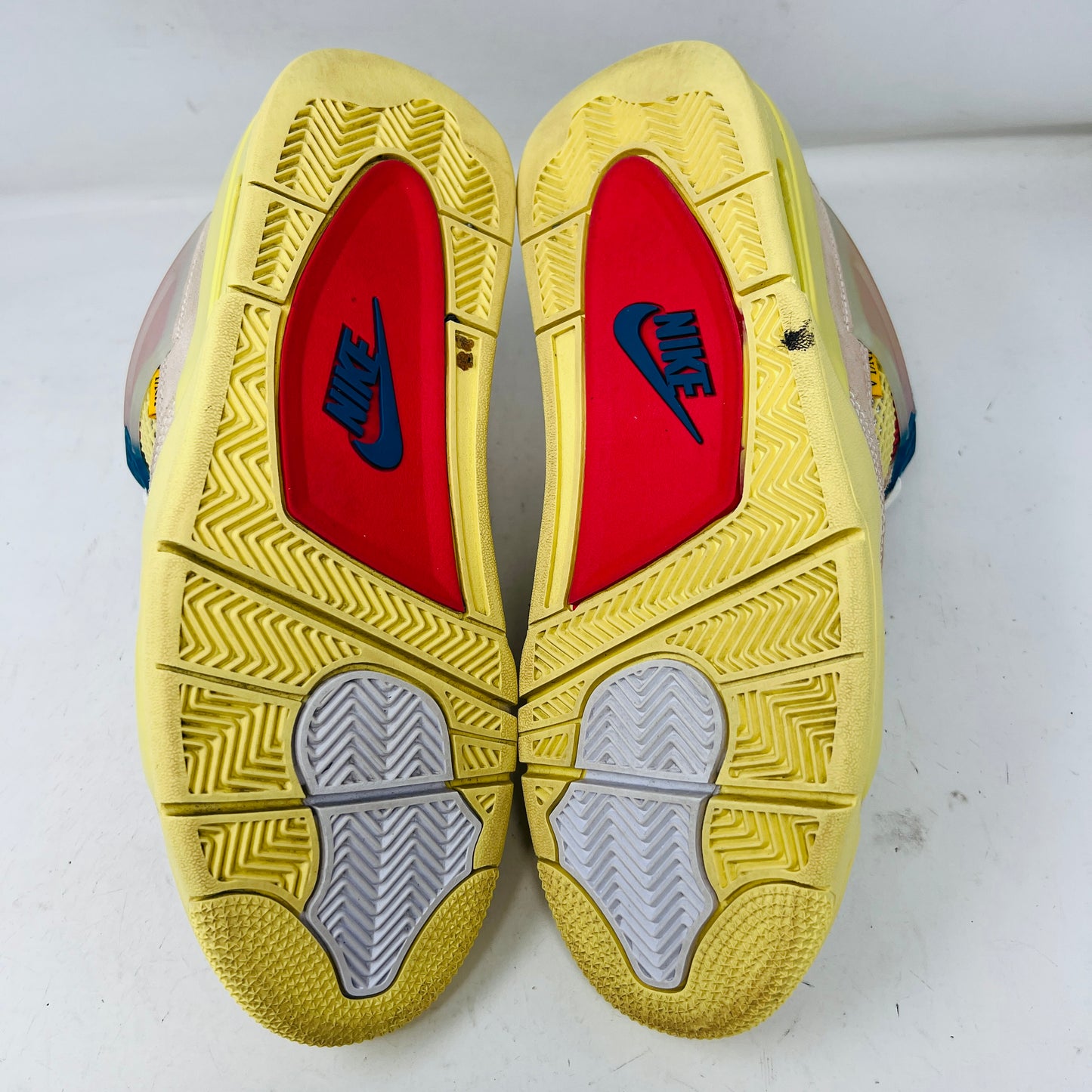 Jordan 4 Retro Union Guava Ice