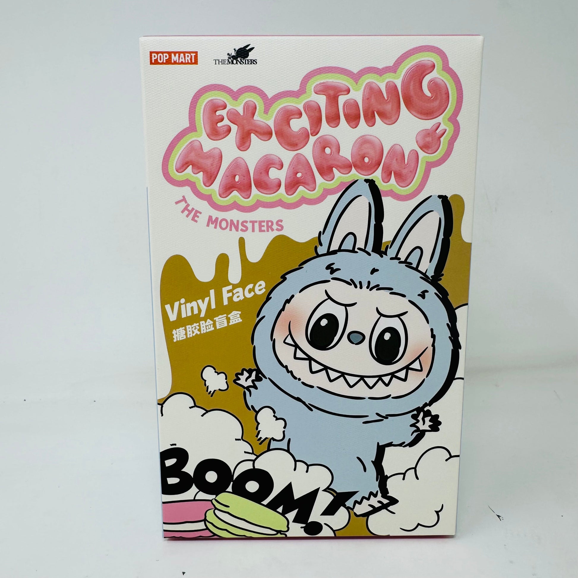 Pop Mart Exciting Macaron Labubu blind box packaging featuring a cartoon monster design.