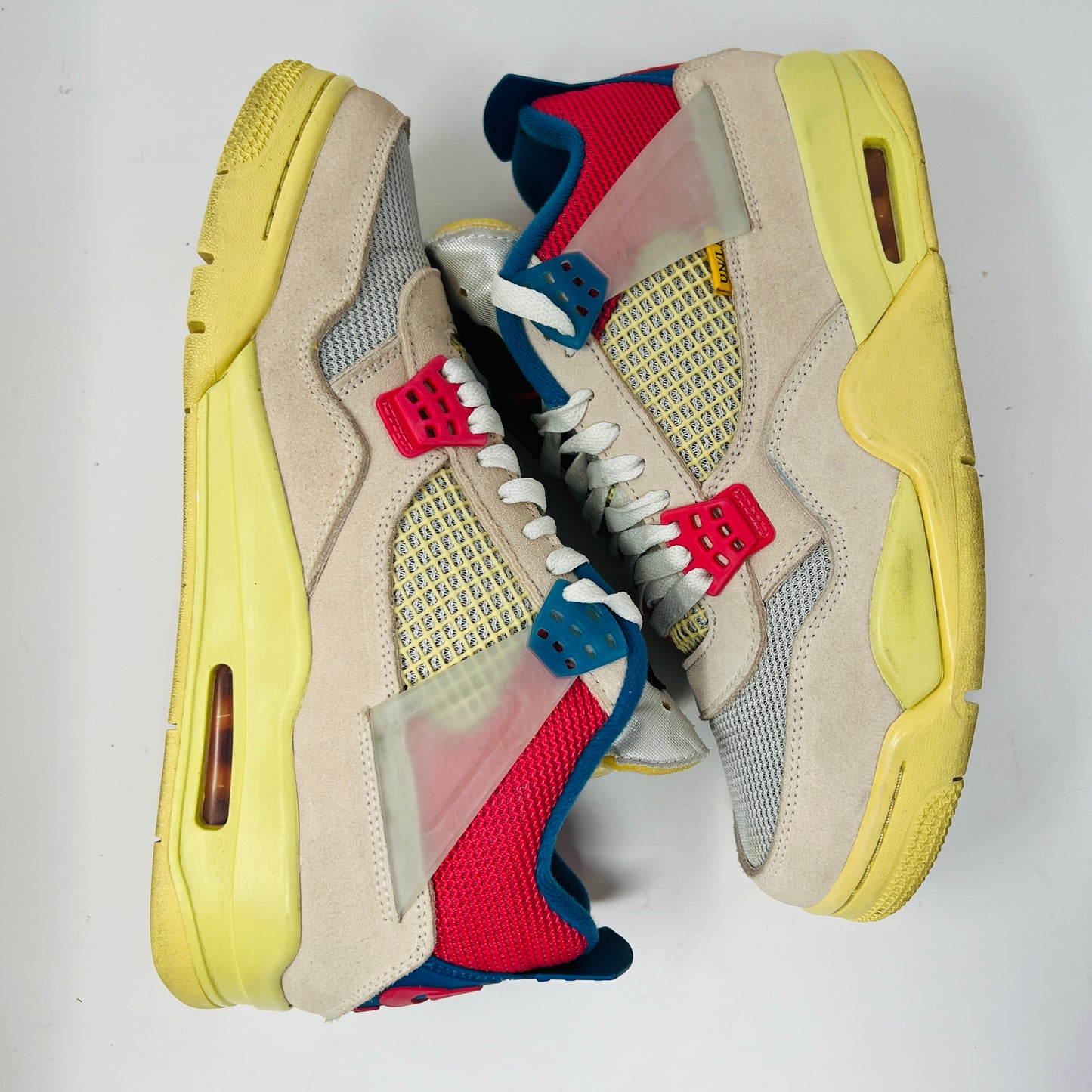 Jordan 4 Retro Union Guava Ice