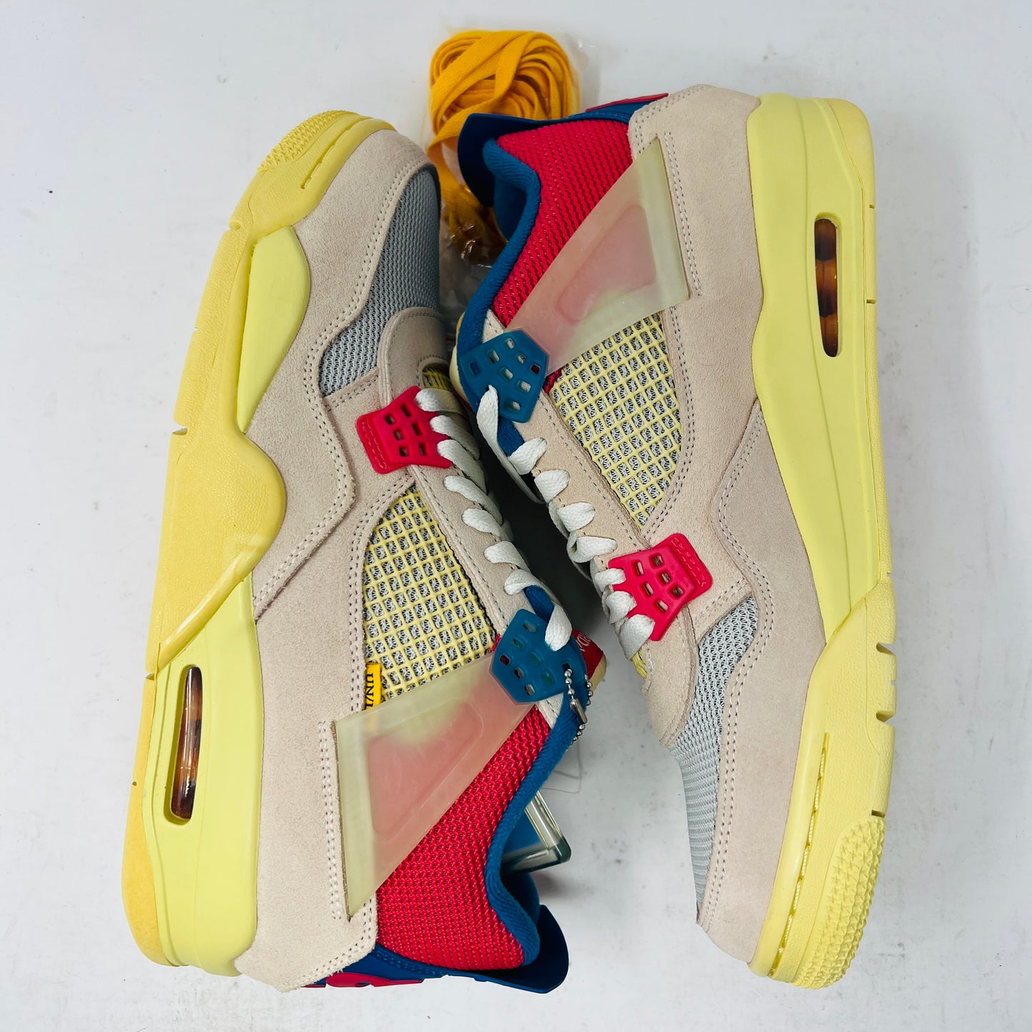 Jordan 4 Retro Union Guava Ice