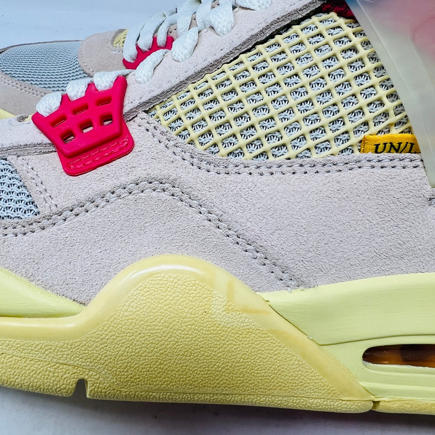 Jordan 4 Retro Union Guava Ice