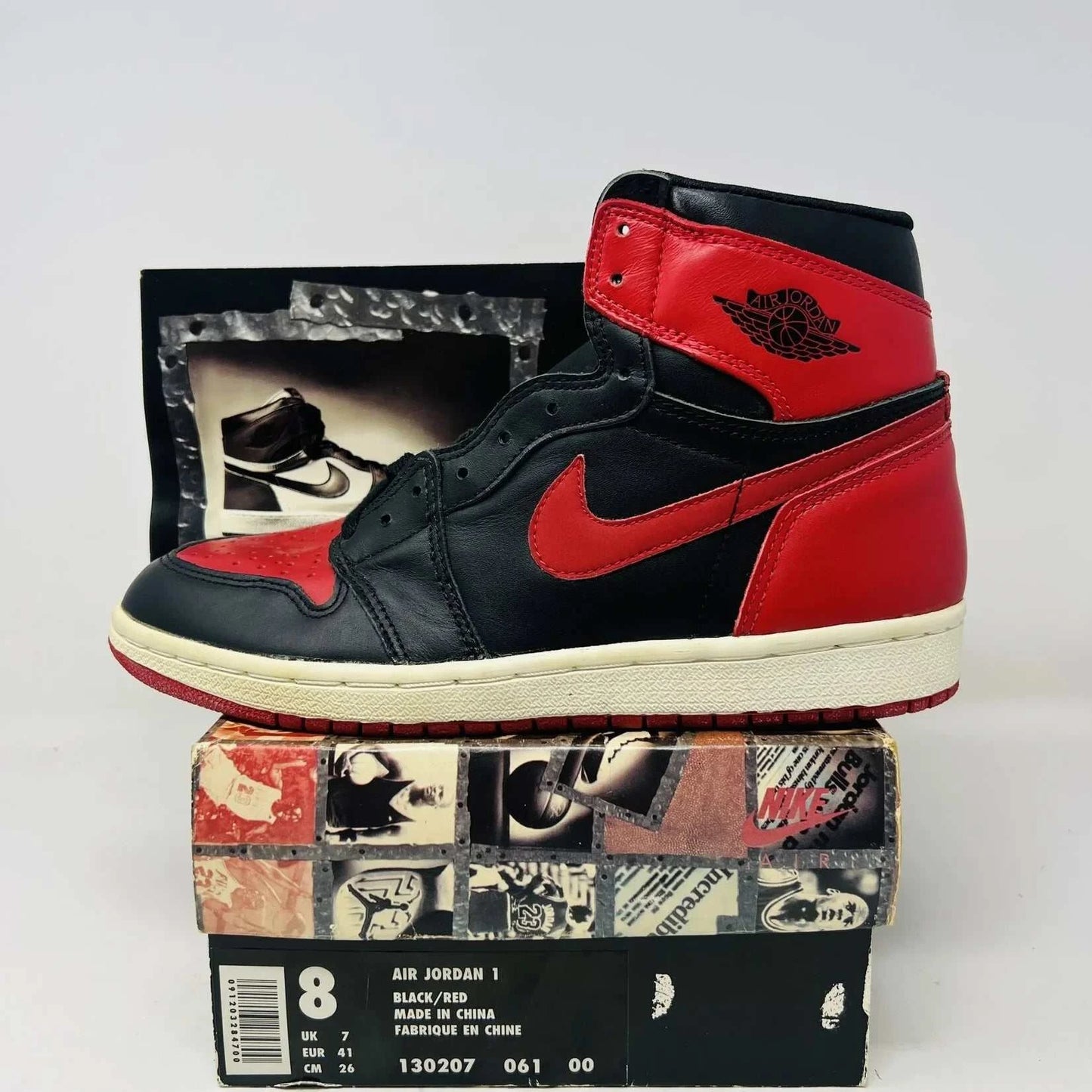 Jordan 1 Retro Bred (1994) sneaker, brand new with box and card, authentic, black and red colorway.