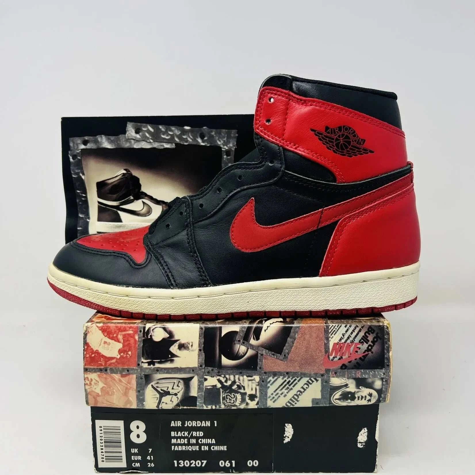Jordan 1 Retro Bred (1994) sneaker, brand new with box and card, authentic, black and red colorway.