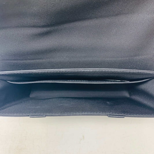 Louis Vuitton Tourillon Monogram Trunk Messenger Bag interior view.