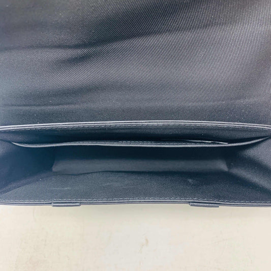 Louis Vuitton Tourillon Monogram Trunk Messenger Bag interior view.