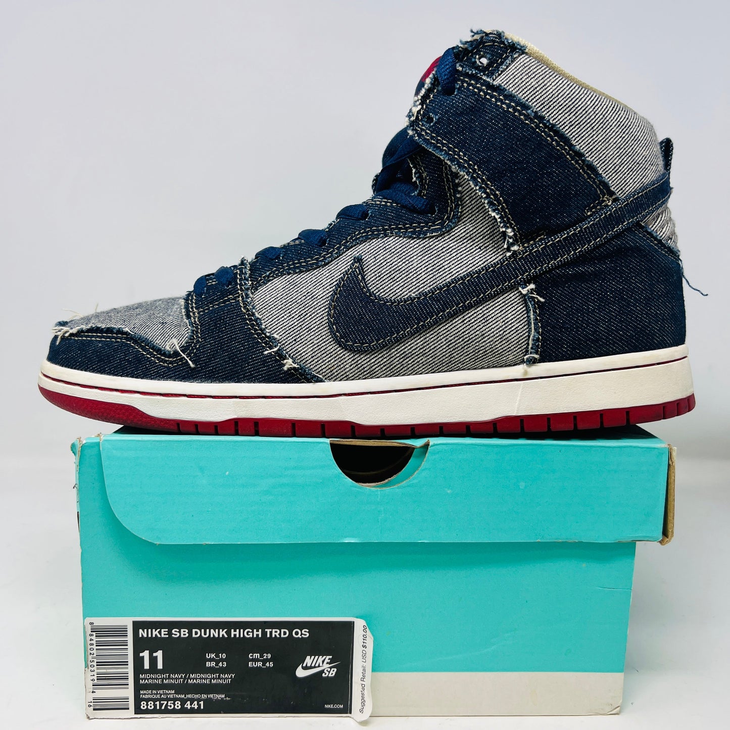 Nike SB Dunk High Reese Forbes Denim sneaker with blue jeans upper, displayed on a box, condition 8.5/10, from 2017.