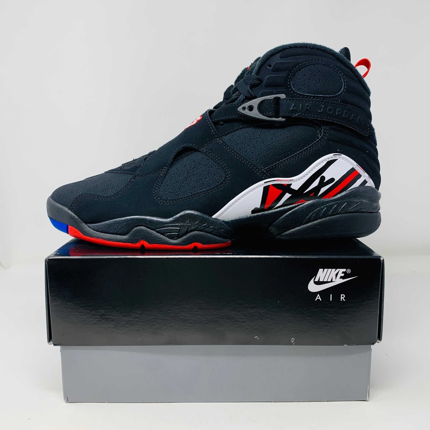 Jordan 8 Retro Playoffs 2023 sneaker in black, red, and white on a Nike box, brand new condition.