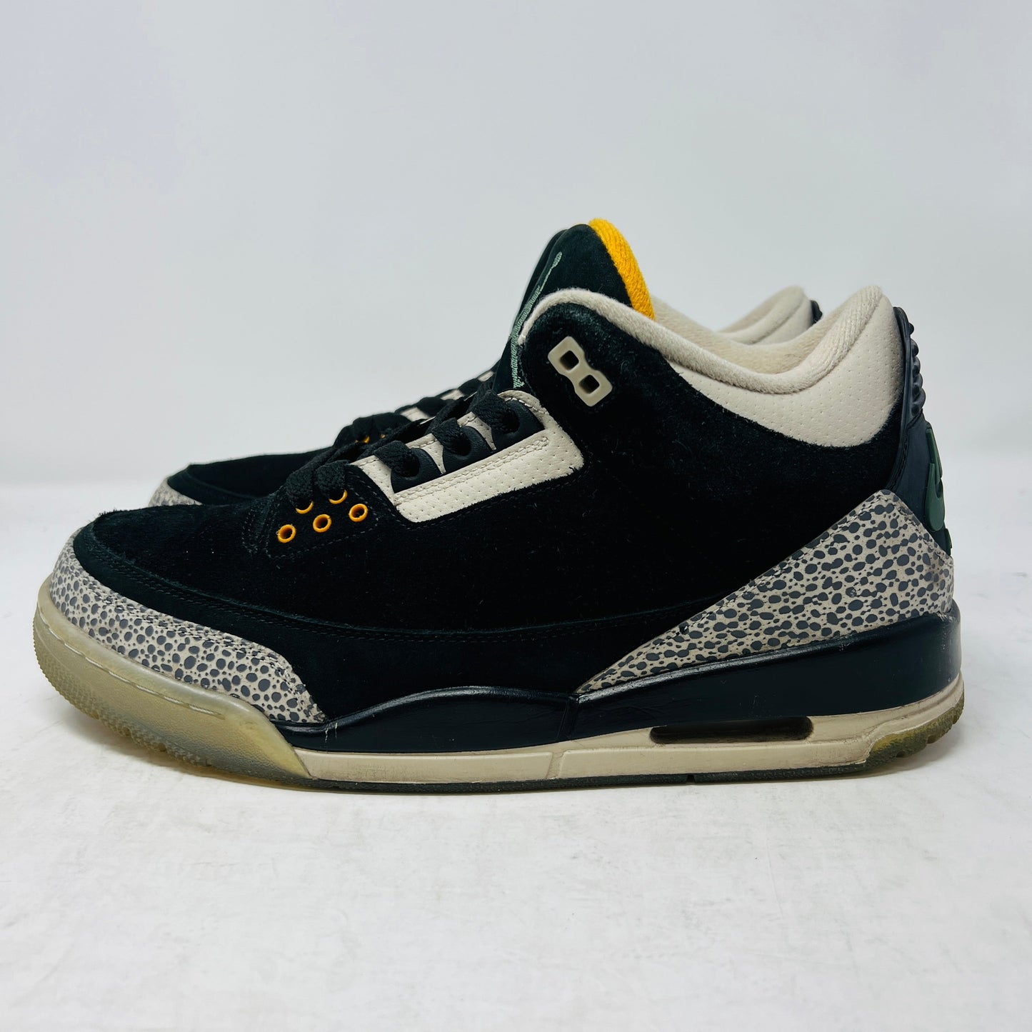 Jordan 3 Retro atmos sneakers with black and grey design, 2017 release.