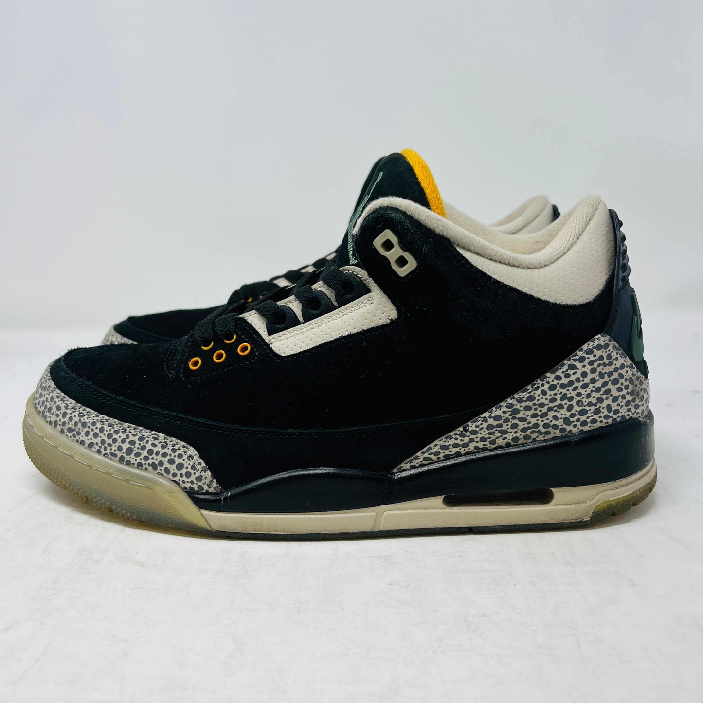 Jordan 3 Retro atmos sneakers with black and grey design, 2017 release.