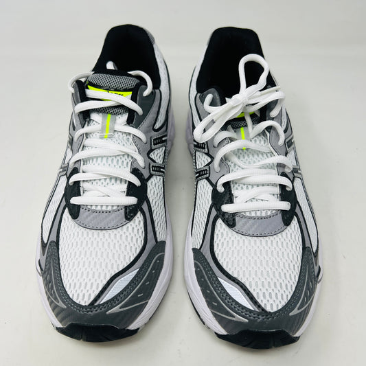 A brand new pair of ASICS GT-2160 JJJJound White sneakers, featuring mesh details and black stripes, is displayed on a black ASICS shoe box with extra laces in front for a complete authentic look.