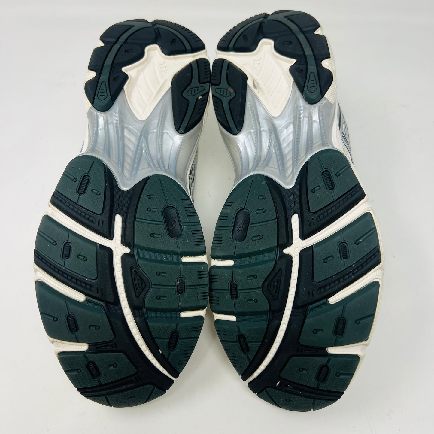 An ASICS GT-2160 Kith Cream Scarab (2023) running shoe with a clean cream and scarab-colored mesh design featuring black accents sits on a brown box. Priced at $350, the box in good condition details sizing and brand logos.