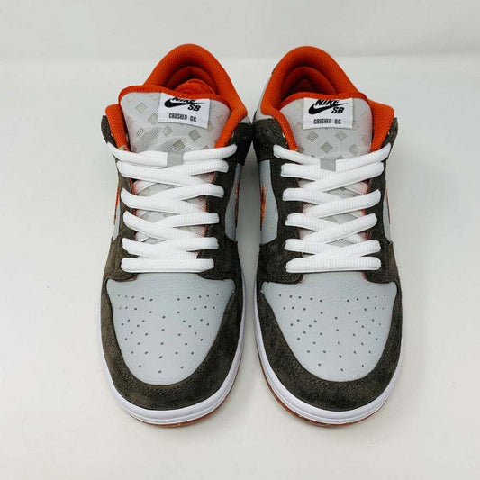 Nike SB Dunk Low Crushed sneaker with crushed velvet upper and orange accents.