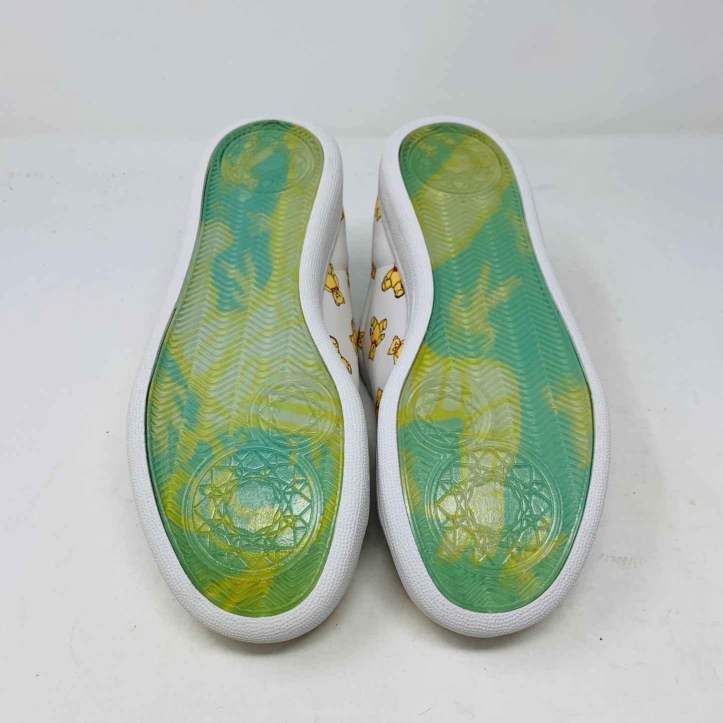 The Wmns Flavor Ice Cream Low Teddy Bears sneakers, featuring playful illustrations of ice cream cones and teddy bears, are displayed on a colorful box that matches the blue and pink theme, along with extra packaging for ice cream-themed items. Brand: ice cream.