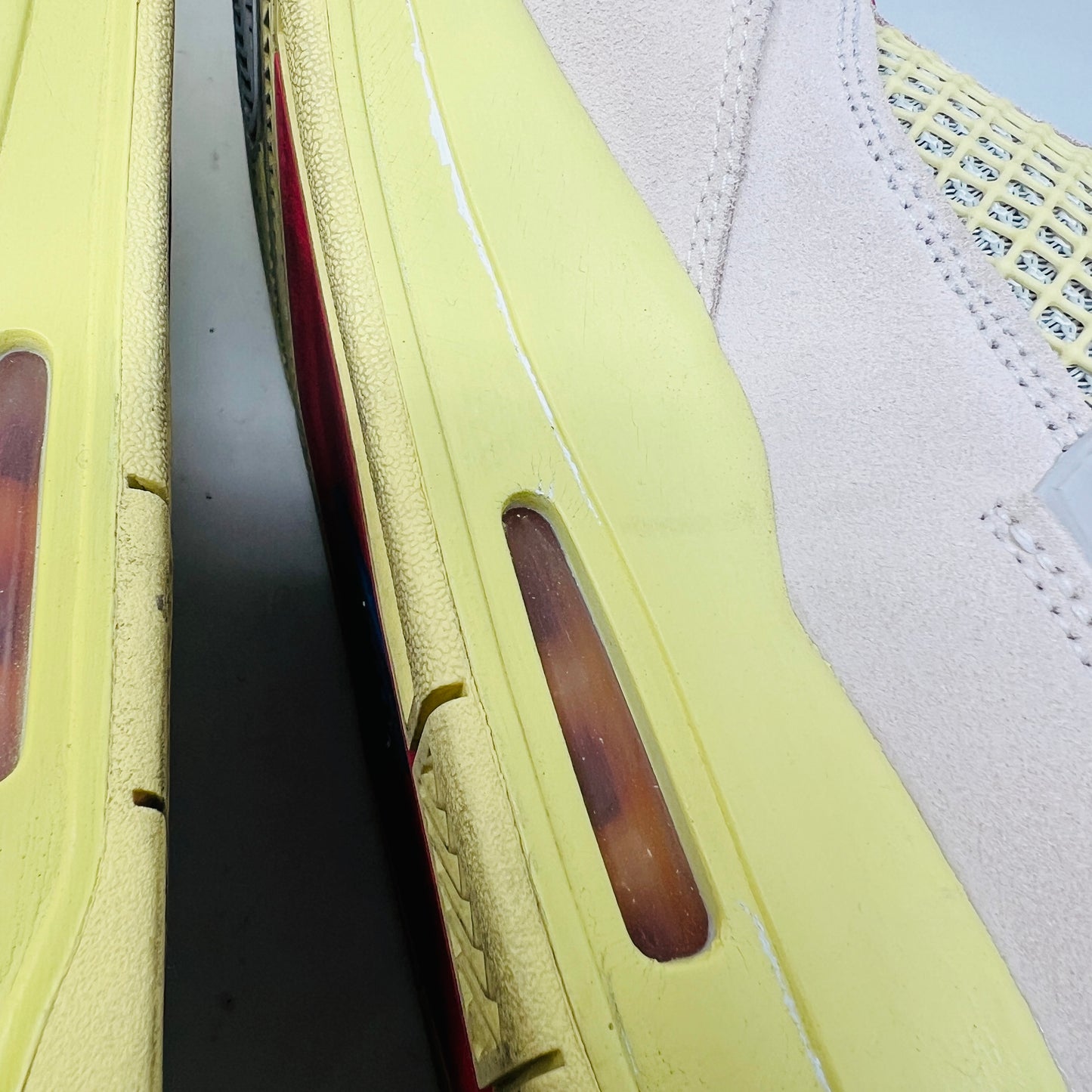 Jordan 4 Retro Union Guava Ice
