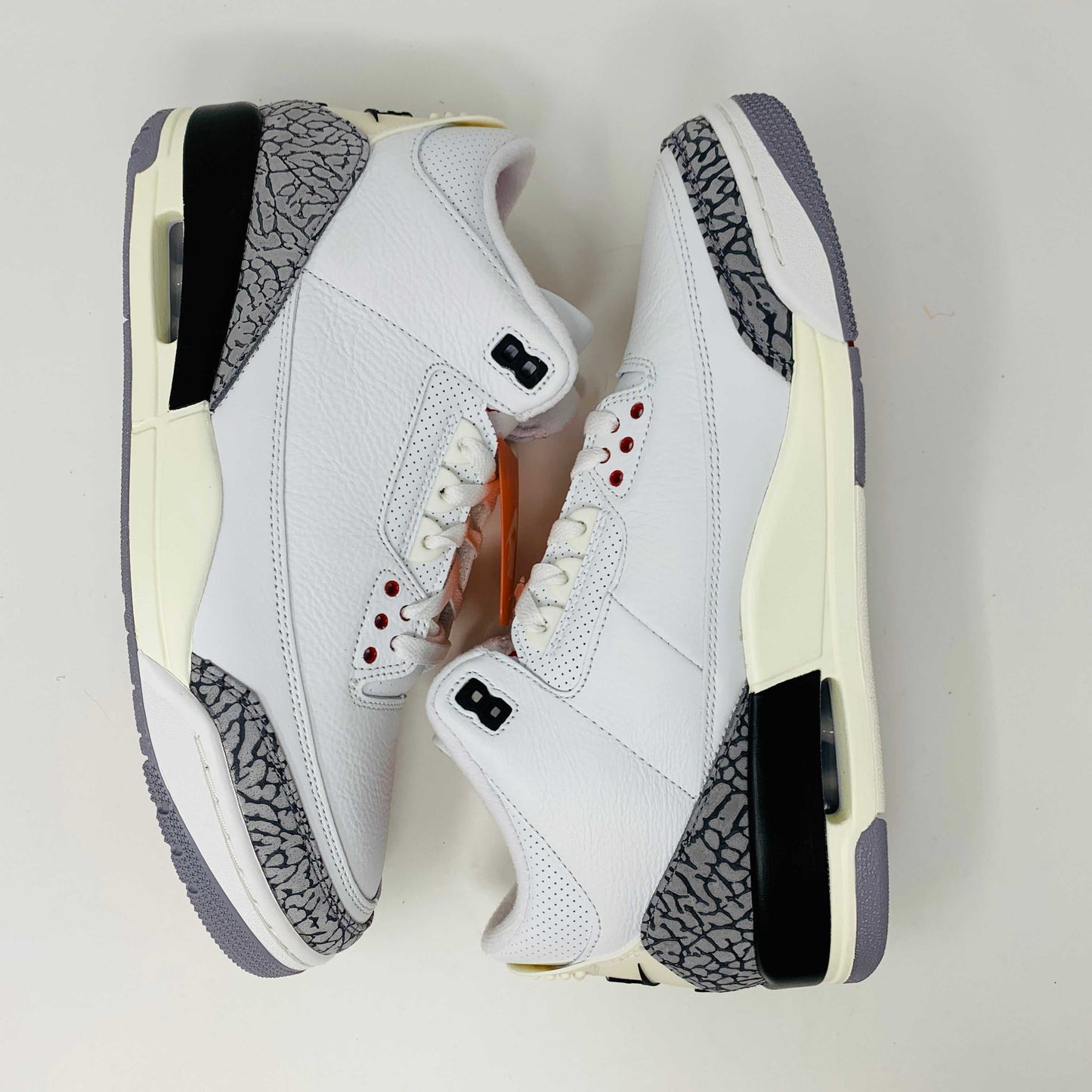 Jordan 3 Retro White Cement Reimagined sneakers with modern design.