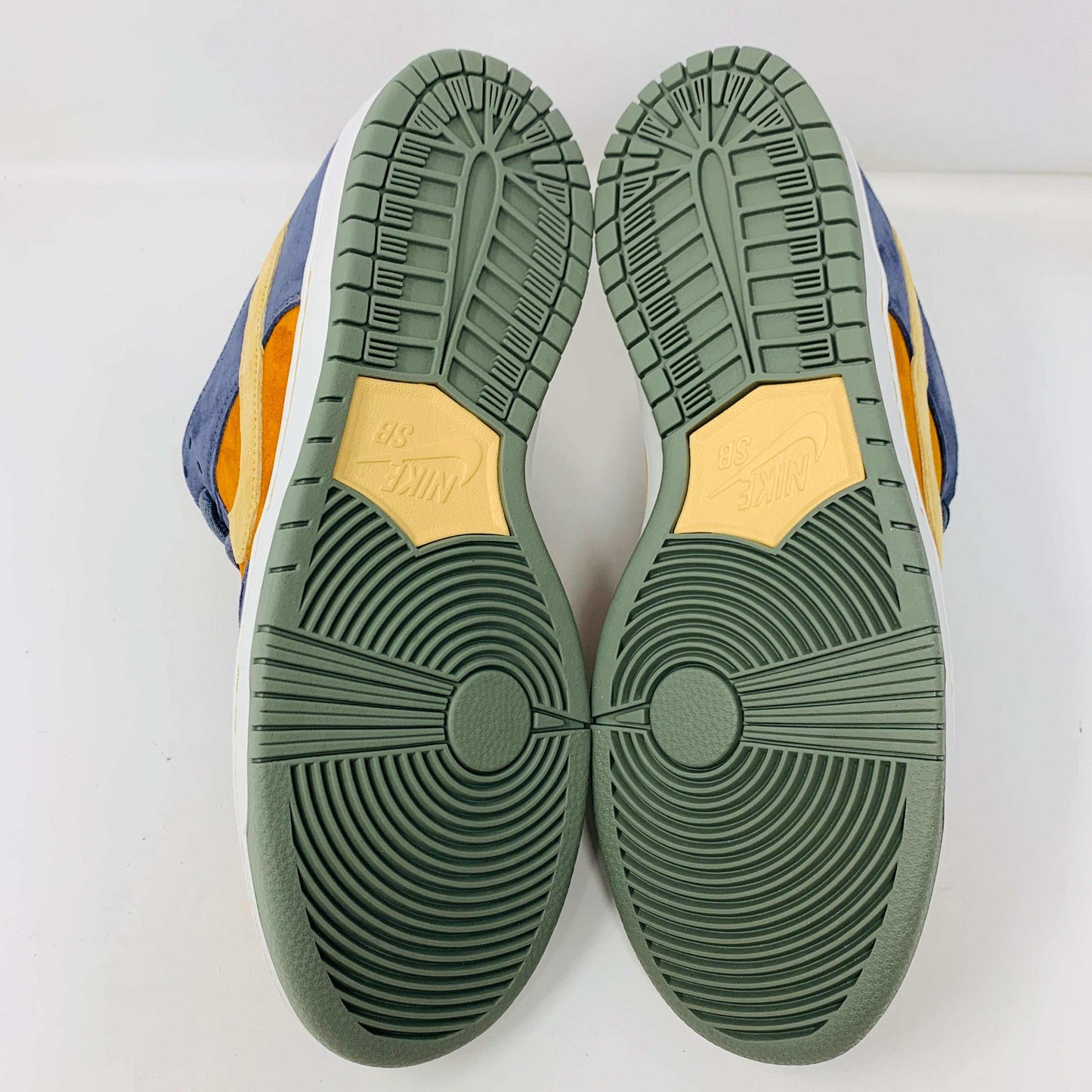Nike SB Dunk Low Light Carbon Monarch sneakers, 2024, viewed from the sole.