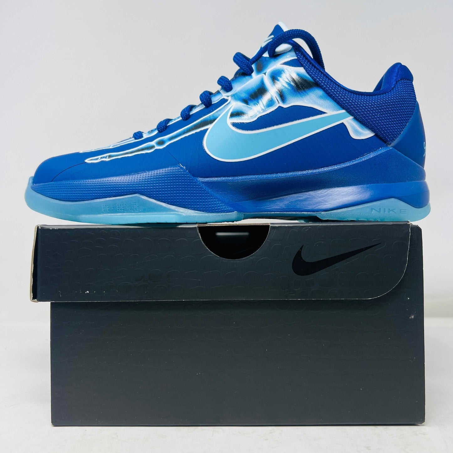 Nike Kobe 5 X-Ray GS sneaker in blue on box, 2024 model, brand new condition.