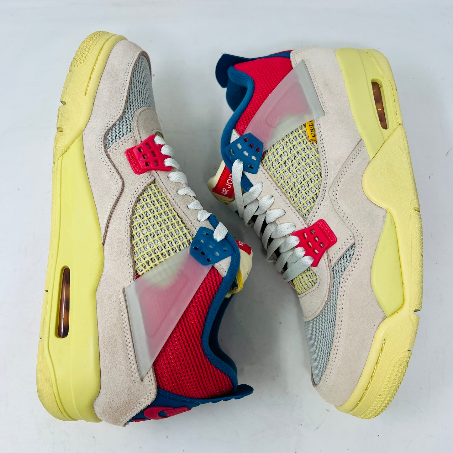 Jordan 4 Retro Union Guava Ice