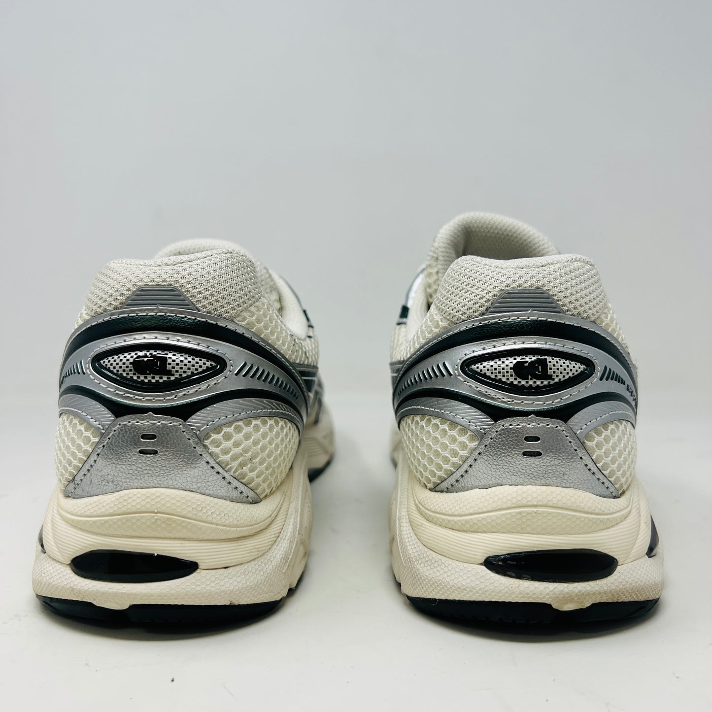 An ASICS GT-2160 Kith Cream Scarab (2023) running shoe with a clean cream and scarab-colored mesh design featuring black accents sits on a brown box. Priced at $350, the box in good condition details sizing and brand logos.
