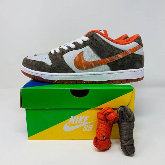 Nike SB Dunk Low Crushed sneaker with a crushed velvet upper and unique design on display box.