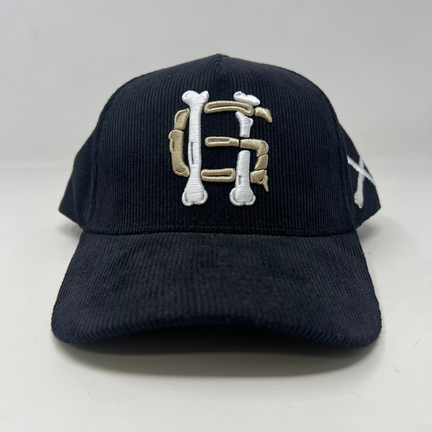 Holy Ground Bones Hat in black corduroy.