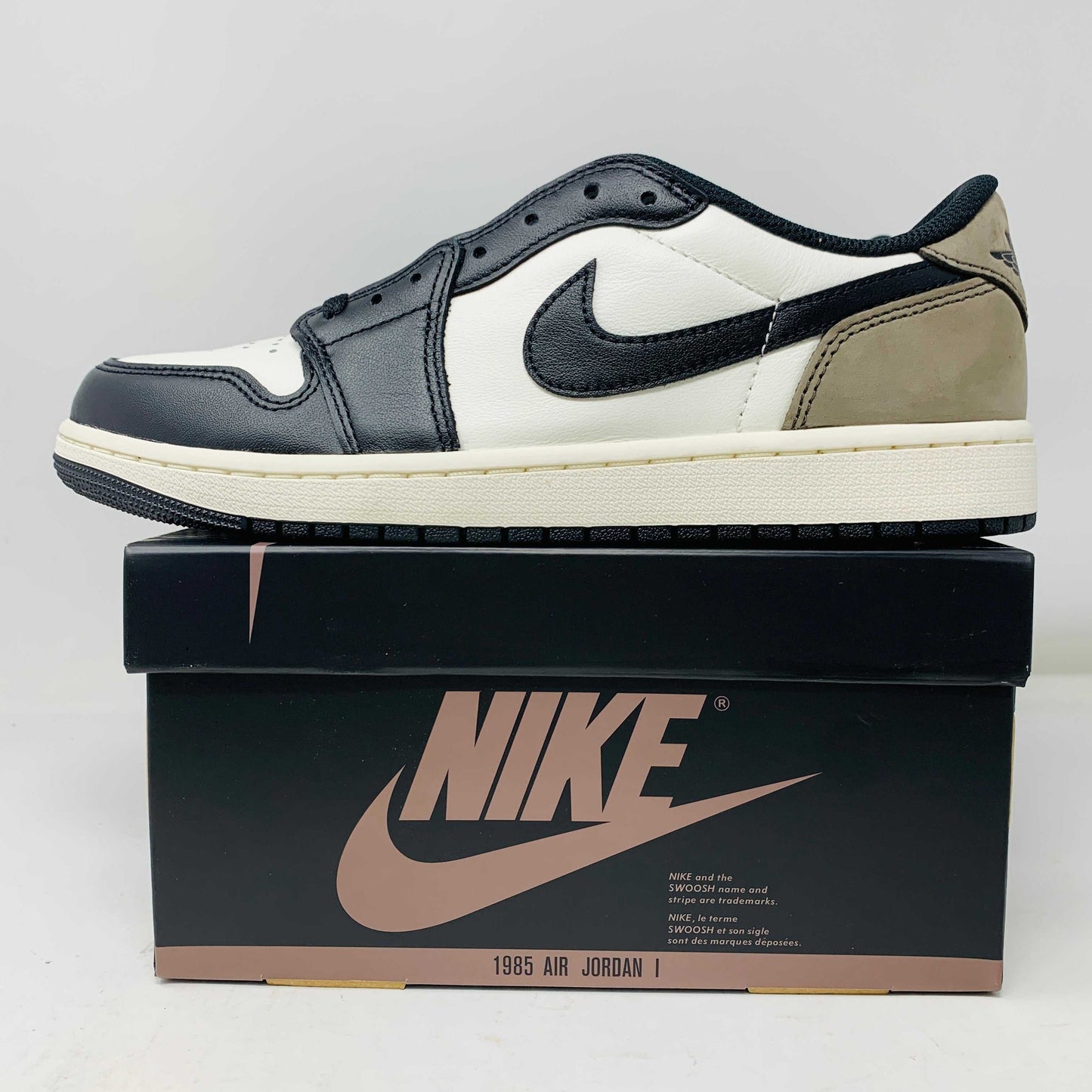 Jordan 1 Retro Low OG Mocha sneakers in black and mocha leather on Nike box, brand new condition, 2024 release.