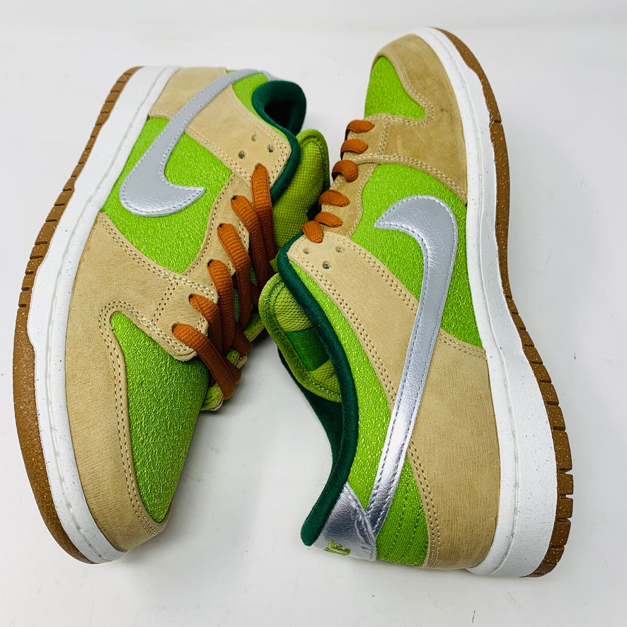 Nike SB Dunk Low Escargot sneakers in beige, green, and silver accents, featuring orange laces.