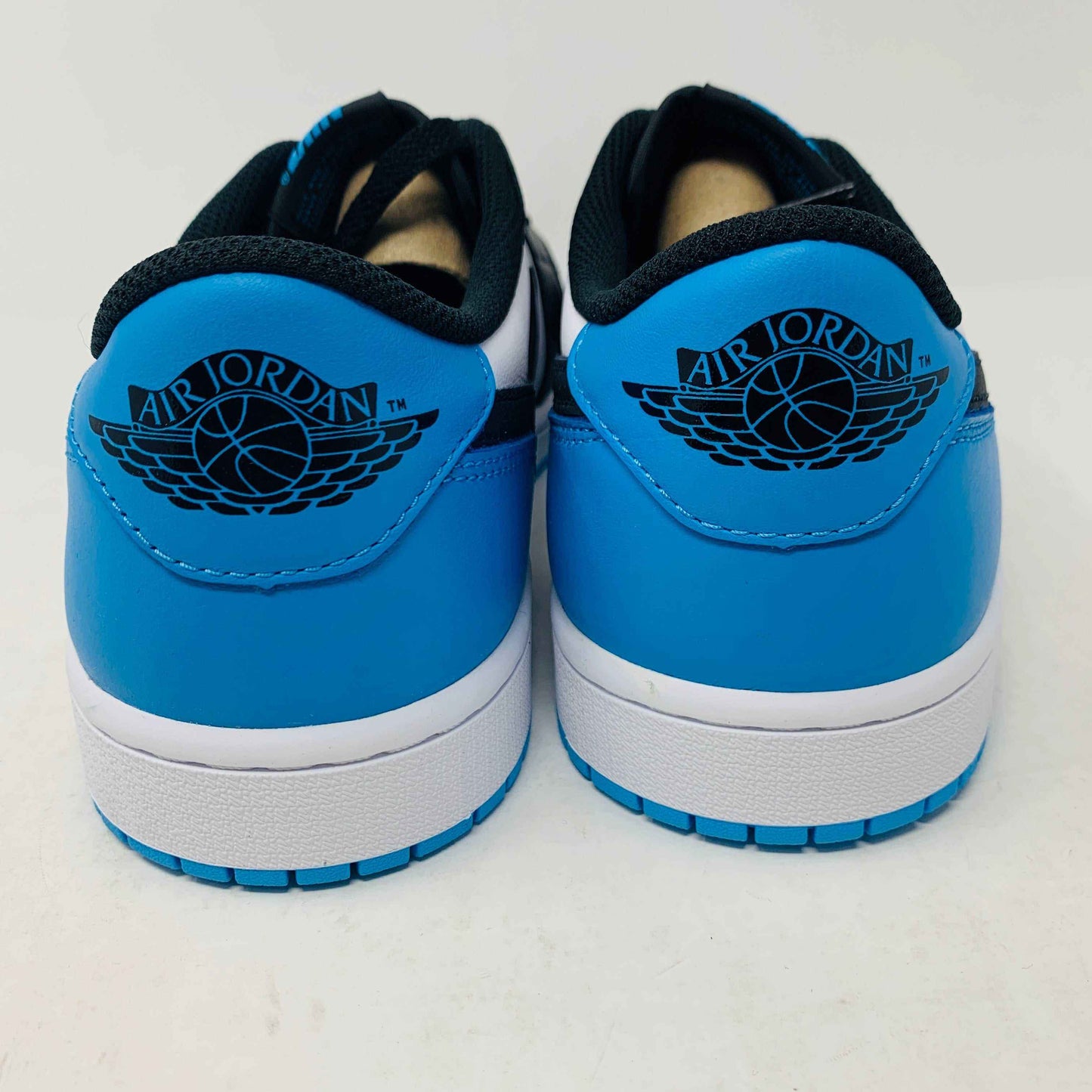 Jordan 1 Low OG Powder Blue sneakers, brand new, 2022 release, featuring extra blue laces.