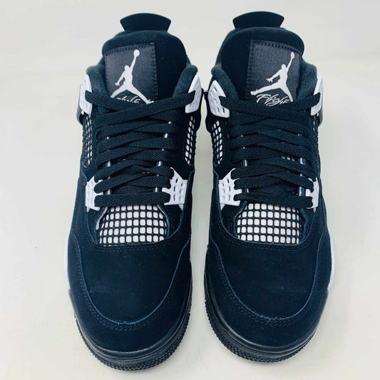 Jordan 4 Retro White Thunder sneakers, brand new, black and white design, 2024 release.