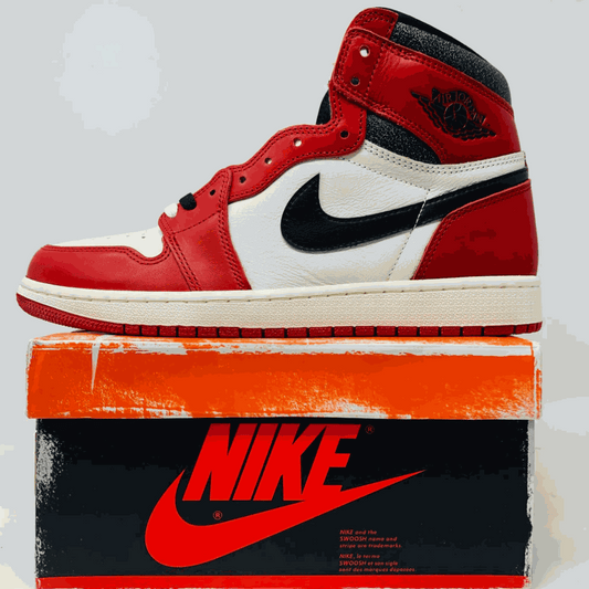 Classic Air Jordan 1 sneaker in red, white, and black on an orange Nike box celebrating 40th anniversary of the Air Jordan 1