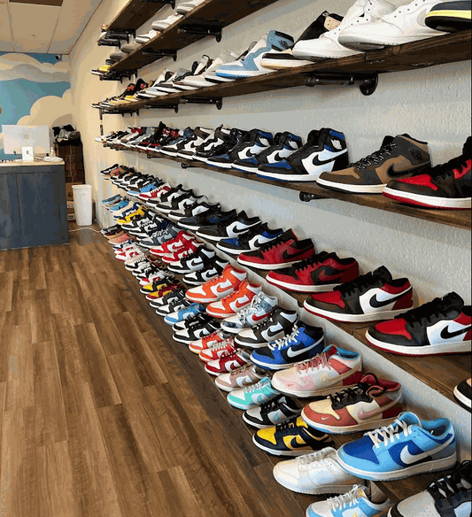 interior view of sneaker shop in Orange County with multiple rows of Nike sneakers displayed on wall shelves