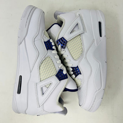 The Jordan 4 Retro Metallic Purple sneaker features white material with blue mesh accents, a visible air cushion in the heel, textured sole, angular overlays, and a padded collar. Note: no box included.