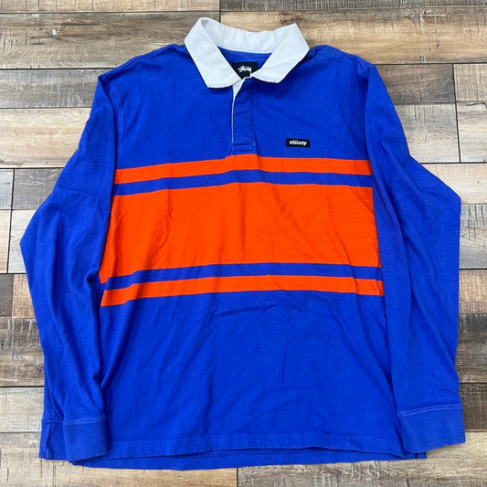 Stussy Stanley L/S Rugby Shirt in Blue with Orange Stripes, Preowned Condition.