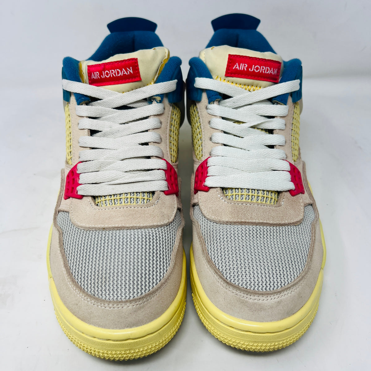 Jordan 4 Retro Union Guava Ice
