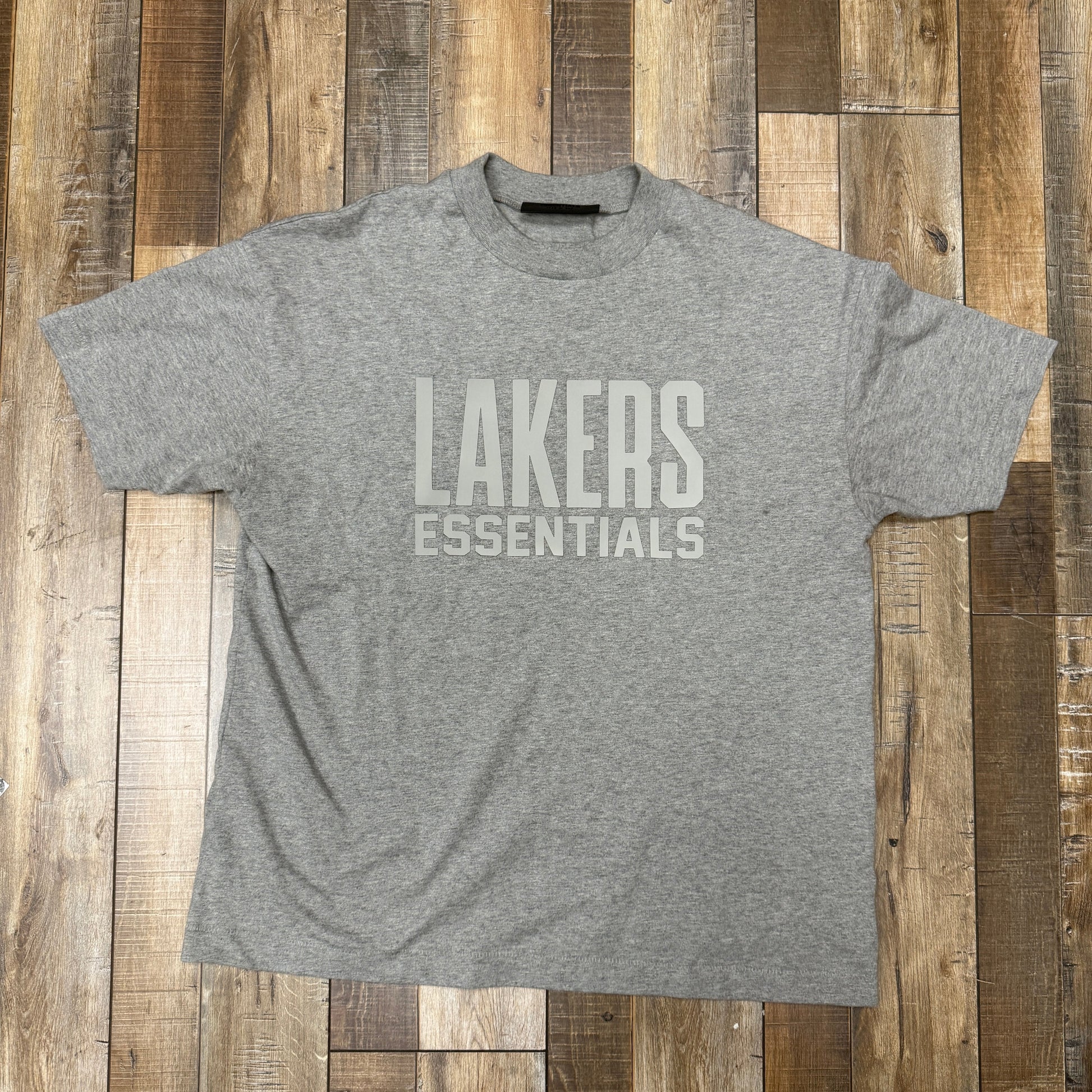 Fear of God Essentials Lakers Tee (SS25) in Warm Heather, preowned condition