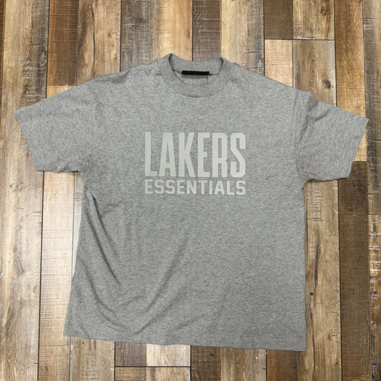 Fear of God Essentials Lakers Tee (SS25) in Warm Heather, preowned condition